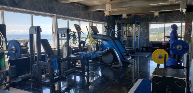 Luxury, clean, well-lit gym studio can help to reach your fitness goals